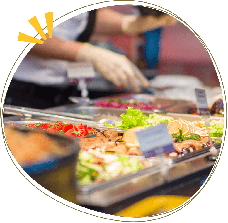 Salads and other dishes with vegetables and meat on table in restaurant